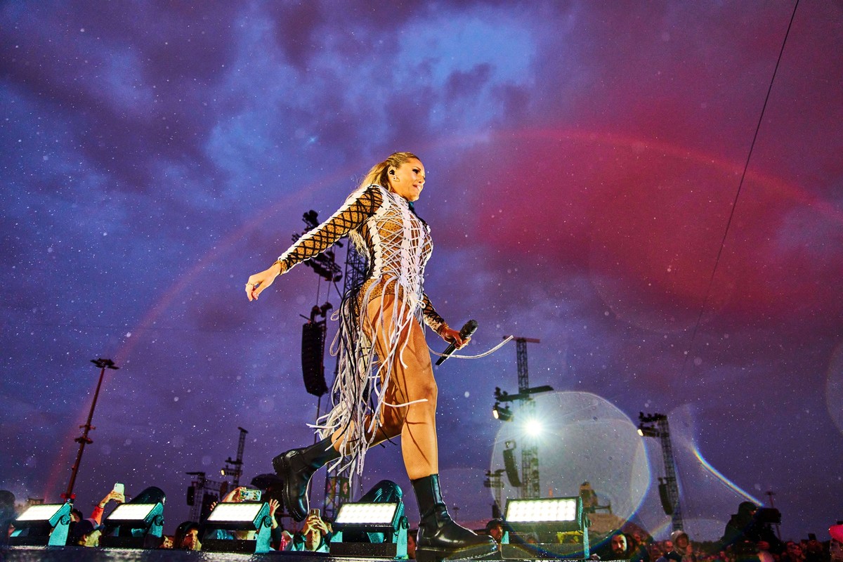 Singer and artist Helene Fischer, GER in front of a rainbow at her concert at the fairground on Aug 20, 2022 in Munich , Germany.