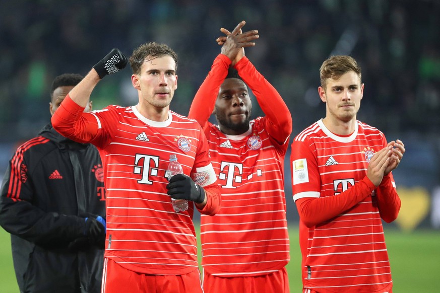 VfL vs. Bayern, 1. BL Wolfsburg, 05.02.2023, FUßBALL - VfL Wolfsburg vs. FC Bayern München, 1. BL, Saison 2022/23. Schlussjubel, Leon Goretzka FC Bayern München, Alphonso Davies FC Bayern München, Jos ...