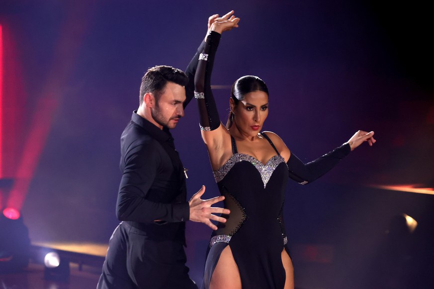 COLOGNE, GERMANY - MARCH 05: Senna Gammour and Robert Beitsch perform on stage during the 1st show of the 14th season of the television competition &quot;Let&#039;s Dance&quot; on March 05, 2021 in Co ...