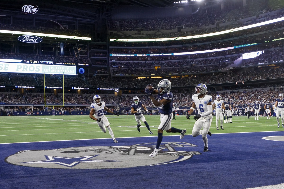 Dallas Cowboys wide receiver Brandin Cooks (3) makes a touchdown catch in front of Detroit Lions safety Ifeatu Melifonwu (6) and cornerback Kindle Vildor (29) during the second half of an NFL football ...