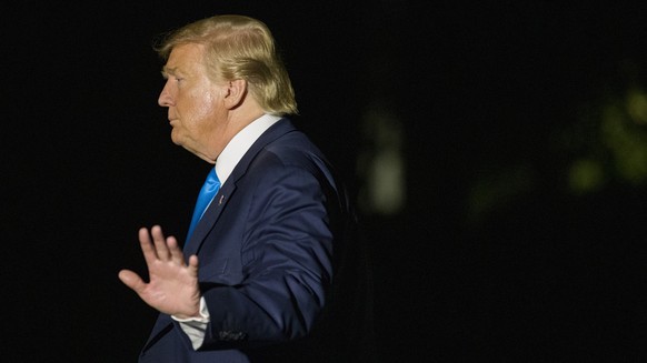 President Donald Trump waves after stepping off Marine One on the South Lawn of the White House, Wednesday, April 10, 2019, in Washington. Trump is returning from a trip to Texas. (AP Photo/Alex Brand ...