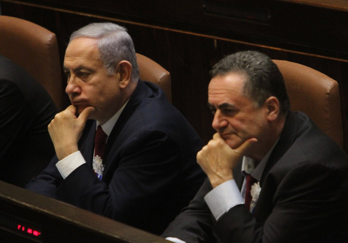 191004 -- JERUSALEM, Oct. 4, 2019 Xinhua -- Israeli Prime Minister Benjamin Netanyahu L and Foreign Minister Yisrael Katz attend a swearing-in ceremony of the Knesset in Jerusalem, Oct. 3, 2019. Israe ...