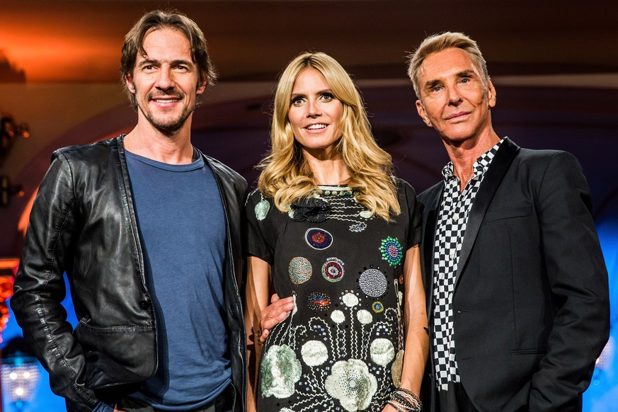 HEIDELBERG, GERMANY - MAY 10: (L-R) Thomas Hayo, Heidi Klum and Wolfgang Joop pose during a photo call for the tv show &#039;Germany&#039;s Next Topmodel&#039; on May 10, 2015 in Heidelberg, Germany.  ...