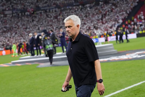 Roma&#039;s head coach Jose Mourinho walks away with his second place medal after receiving it at the end of the Europa League final soccer match between Sevilla and Roma, at the Puskas Arena in Budap ...