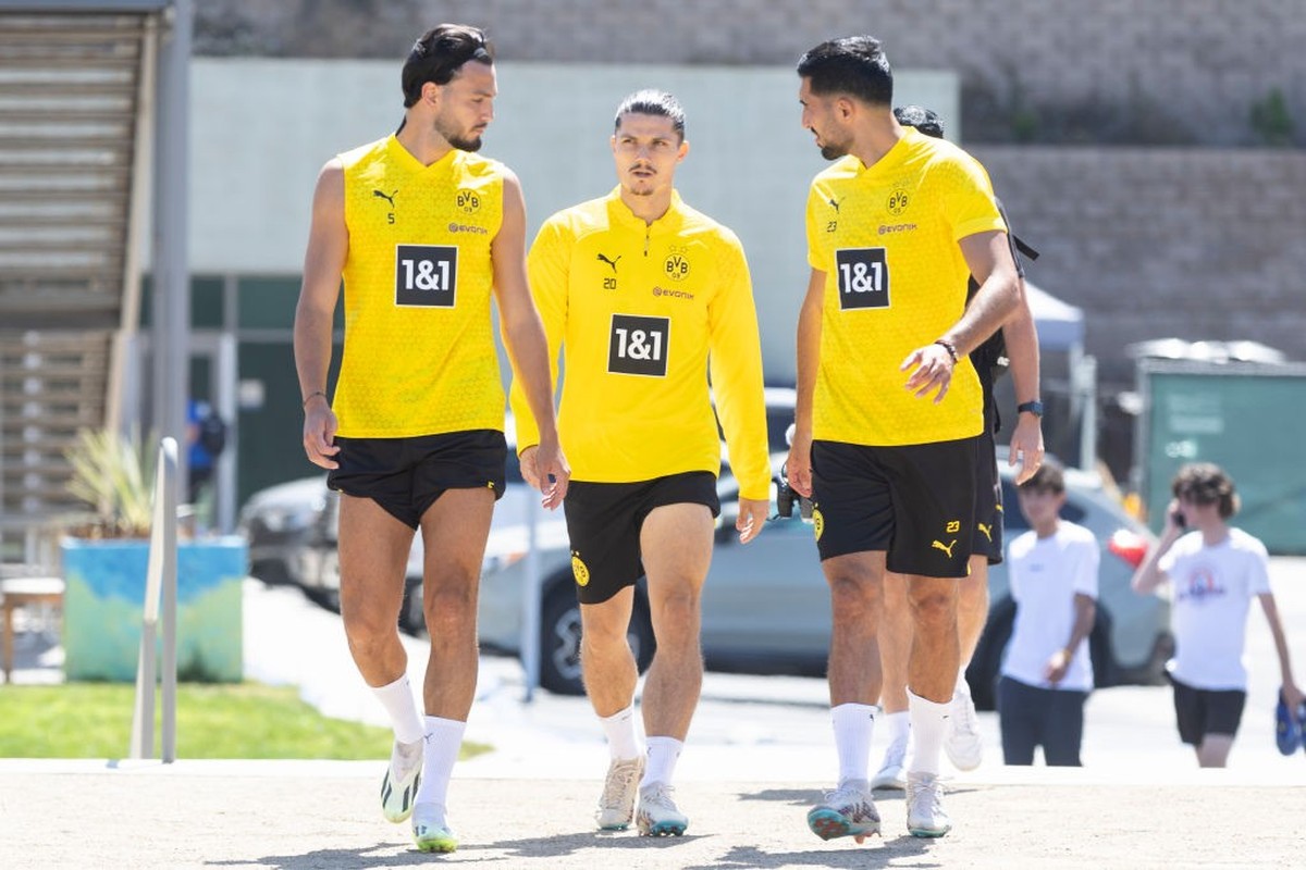 SAN DIEGO, CALIFORNIA - JULY 26: Ramy Bensebaini of Borussia Dortmund, Marcel Sabitzer of Borussia Dortmund and Emre Can of Borussia Dortmund look on during the Borussia Dortmund Training Session on J ...