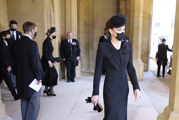 Kate, Duchess of Cambridge, center, arrives to attend the funeral of Britain's Prince Philip inside Windsor Castle in Windsor, England, Saturday, April 17, 2021. Prince Philip died April 9 at the age  ...