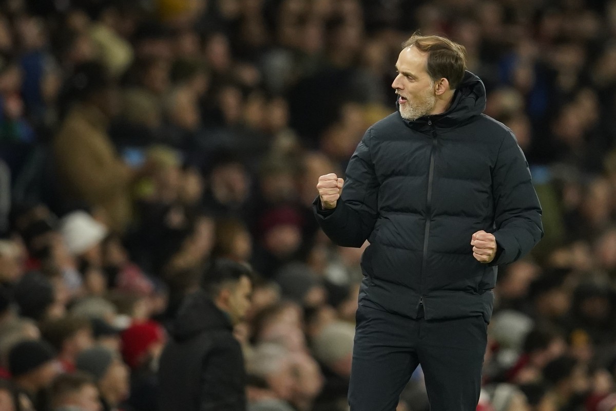 Bayern&#039;s head coach Thomas Tuchel celebrates after Bayern&#039;s Kingsley Coman scored his side&#039;s opening goal during the group A Champions League soccer match between Manchester United and  ...