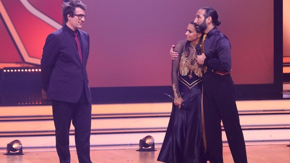 COLOGNE, GERMANY - APRIL 29: Daniel Hartwich, Amira Pocher and Massimo Sinató speak on stage during the 9th show of the 15th season of the television competition show &quot;Let&#039;s Dance&quot; at M ...