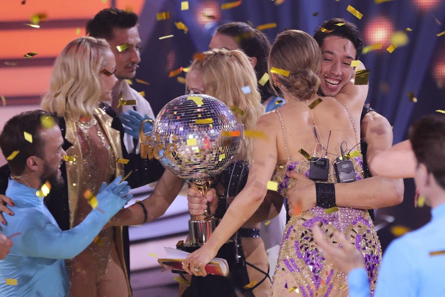 COLOGNE, GERMANY - MAY 20: Kathrin Menzinger and Rene Casselly celebrate winning the final show of the 15th season of the television competition show &quot;Let&#039;s Dance&quot; at MMC Studios on May ...