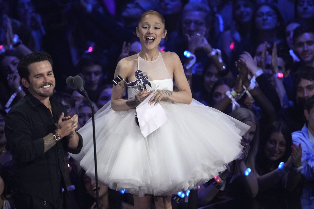 Christian Breslauer, left, and Ariana Grande accept the award for video of the year for &quot;Brighter Days Ahead&quot; during the MTV Video Music Awards on Sunday, Sept. 7, 2025, at UBS Arena in Elmo ...
