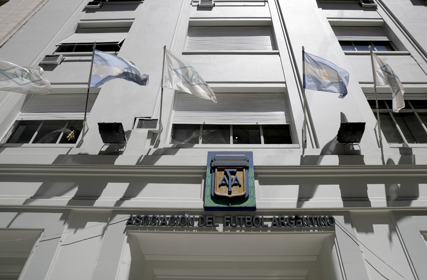 Flags fly in front of the Argentine Football Association, AFA, headquarters, in Buenos Aires, Argentina, Thursday, Nov. 16, 2017. The former CEO of the sports marketing company Torneos y Competencias  ...