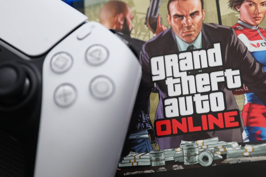 GTA V PlayStation Game Photo Illustration PlayStation DualSense controller and Grand Theft Auto Online game are seen in this illustration photo taken in Krakow, Poland on August 10, 2023. Krakow Polan ...