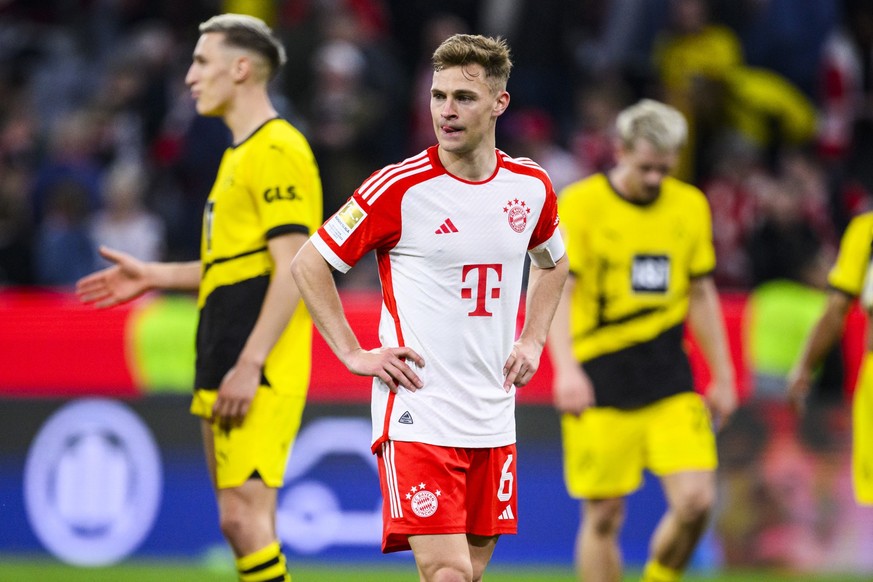 30.03.2024, Bayern, München: Fußball: Bundesliga, Bayern München - Borussia Dortmund, 27. Spieltag, Allianz Arena. Münchens Joshua Kimmich reagiert nach dem Spiel unzufrieden. Foto: Tom Weller/dpa - W ...