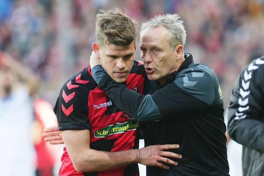 Der Flo-Flüsterer: Freiburg-Trainer Christian Streich (r.) hat Niederlechner besser gemacht.