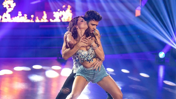 COLOGNE, GERMANY - FEBRUARY 28: Luca Haenni and Christina Luft perform on stage during the 1st show of the 13th season of the television competition &quot;Let&#039;s Dance&quot; on February 28, 2020 i ...