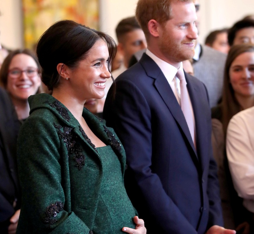 FILE PHOTO: Britain's Prince Harry and Meghan, Duchess of Sussex attend a Commonwealth Day youth event at Canada House in London, Britain, March 11, 2019. Chris Jackson/Pool via REUTERS/File Photo