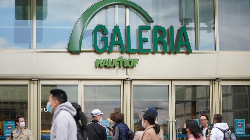 TRIER, GERMANY - SEPTEMBER 07: Branches of German department store chains Karstadt and Galeria Kaufhof stand opposite one another in a shopping street on September 7, 2018 in Trier, Germany. According ...