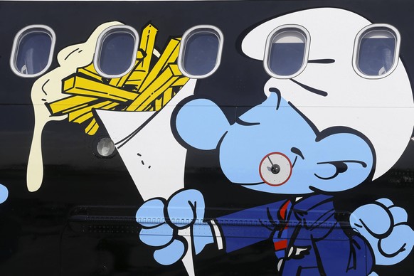 illustartion picture shows the presentation of the Smurfs (Smurfen - Schtroumpfs) aircraft of Brussels Airlines, at Brussels Airport, in Zaventem Saturday 24 March 2018. PUBLICATIONxINxGERxSUIxAUTxONL ...