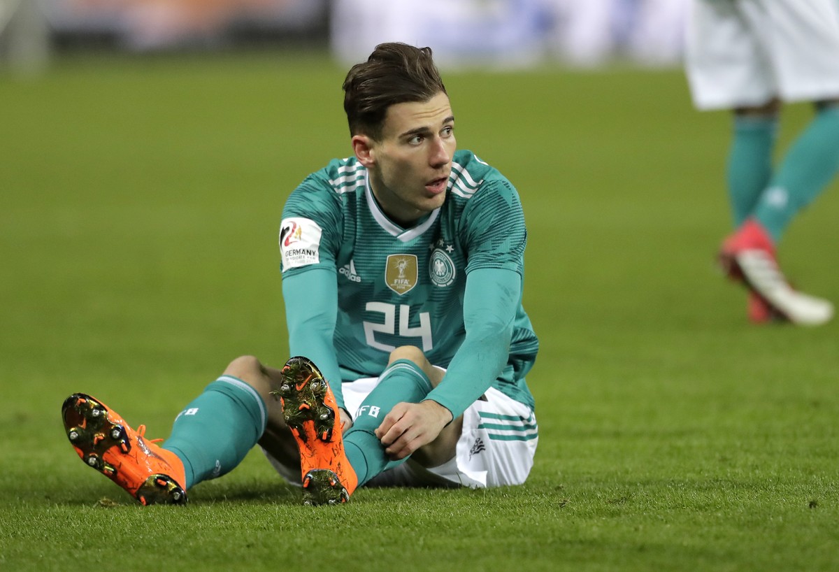 Germany&#039;s Leon Goretzka pulls up his socks during the international friendly soccer match between Germany and Brazil in Berlin, Germany, Tuesday, March 27, 2018. (AP Photo/Markus Schreiber)