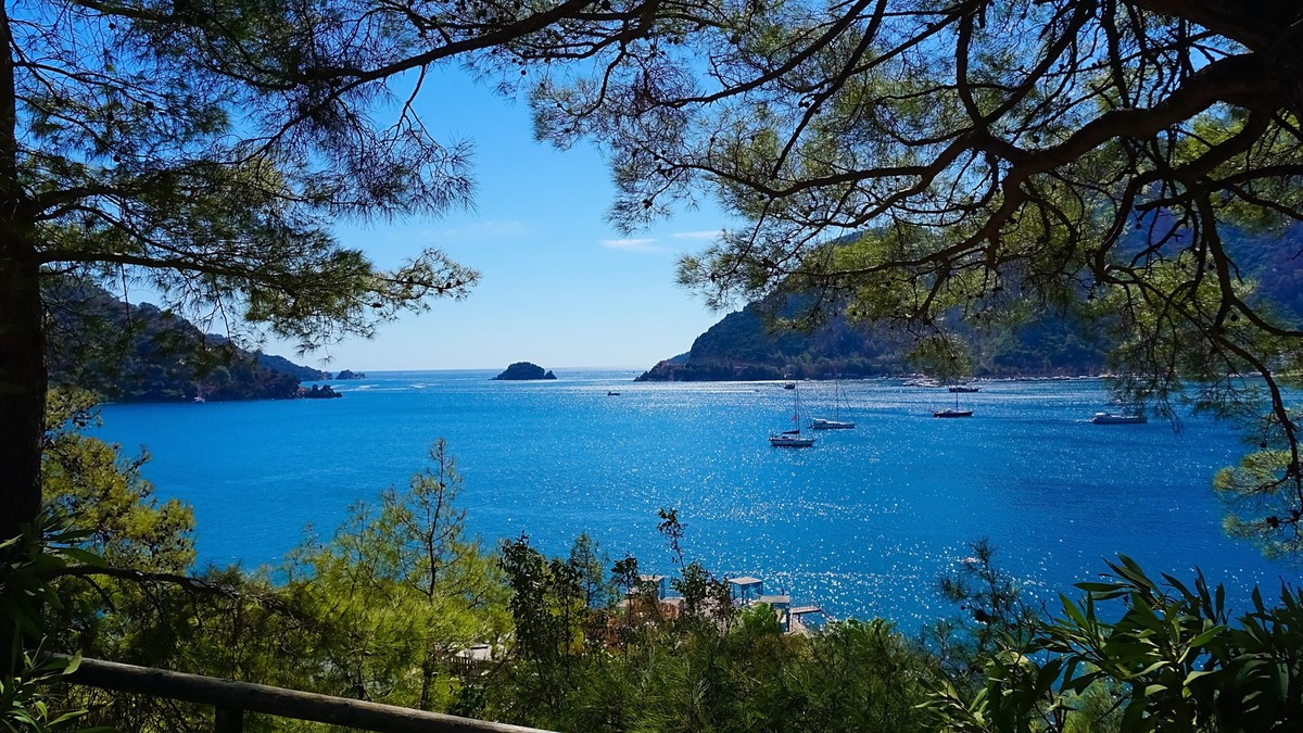 Icmeler Beach view in Marmaris Town. Summer landscape on the Mediterranean coast in Turkey., Icmeler Beach view in Marmaris Town. Summer landscape on the Mediterranean coast in Turkey. View of the bay ...