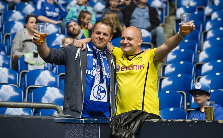 GELSENKIRCHEN, GERMANY - APRIL 01: The fans prior to the Bundesliga match between FC Schalke 04 and Borussia Dortmund at the Veltins-Arena on April 01, 2017 in Gelsenkirchen, Germany. (Photo by Alexan ...