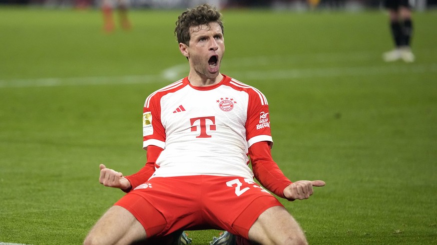FILE - Bayern&#039;s Thomas Mueller celebrates a goal that was later disallowed by a VAR decision during the German Bundesliga soccer match between Bayern Munich and Stuttgart in Munich, Germany, Sund ...
