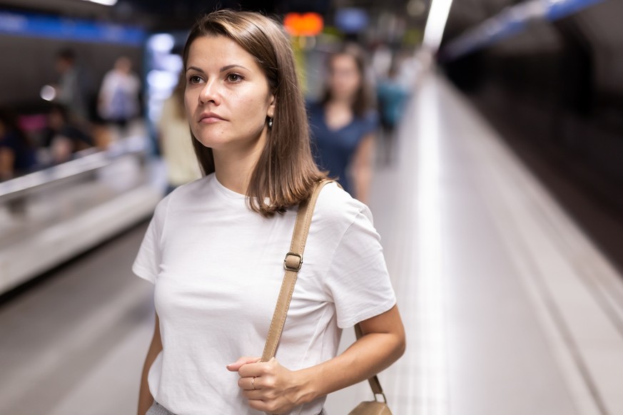 Attractive woman waiting for the subway train