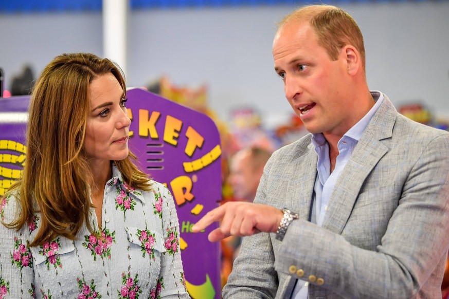 . 05/08/2020. Barry Island, United Kingdom. Prince William and Kate Middleton, the Duke and Duchess of Cambridge, during a visit to Barry Island, South Wales, United Kingdom. During the visit they enj ...