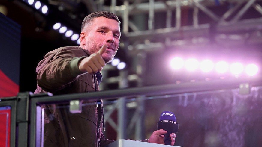 COLOGNE, GERMANY - OCTOBER 07: Former German national player Lukas Podolski seen on the TV platform prior to the international friendly match between Germany and Turkey at RheinEnergieStadion on Octob ...