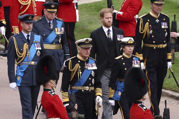 Britain&#039;s King Charles III, Princess Anne, Prince William and Prince Harry follow the coffin at St. George&#039;s Chapel at Windsor Castle, Windsor, England, Monday Sept. 19, 2022, ahead of the c ...