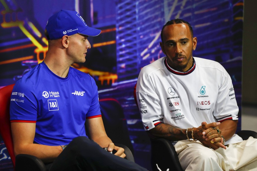 47 Mick Schumacher DEU, Haas F1 Team, 44 Lewis Hamilton GBR, Mercedes-AMG Petronas F1 Team, F1 Grand Prix of Singapore at Marina Bay Street Circuit on September 29, 2022 in Singapore, Singapore. Photo ...