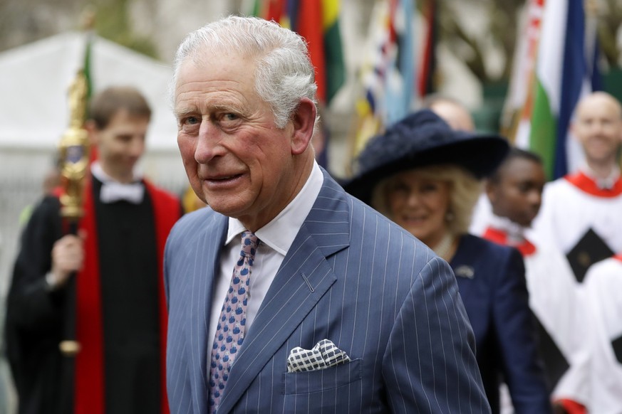 FILE - In this Monday, March 9, 2020 file photo, Britain&#039;s Prince Charles and Camilla the Duchess of Cornwall, in the background, leave after attending the annual Commonwealth Day service at West ...