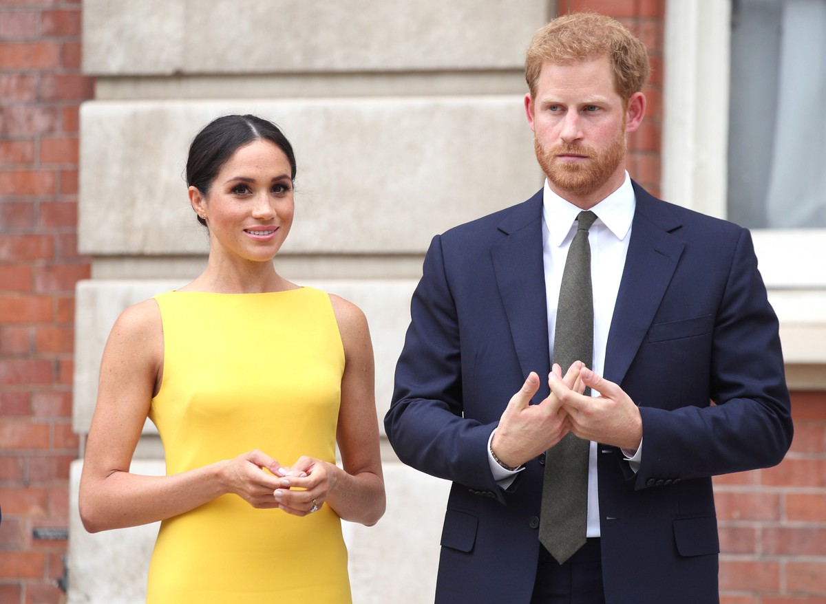 ARCHIV - 05.07.2018, Gro�britannien, London: Prinz Harry von Gro�britannien und seine Frau Meghan w�hrend des Empfangs &quot;Dein Commonwealth-Herausforderung f�r die Jugend&quot; im Marlborough House ...