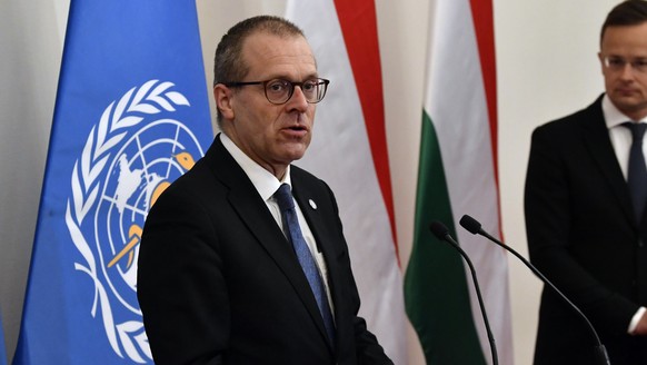 FILE - Hans Kluge, Regional Director for Europe at the World Health Organization (WHO) hold a press conference with Hungarian Minister of Foreign Affairs and Trade Peter Szijjarto, right, at the Minis ...