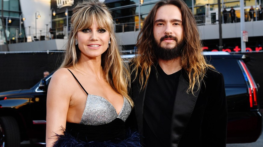 LOS ANGELES, CALIFORNIA - NOVEMBER 24: (L-R) Heidi Klum and Tom Kaulitz attend the 2019 American Music Awards at Microsoft Theater on November 24, 2019 in Los Angeles, California. (Photo by Emma McInt ...