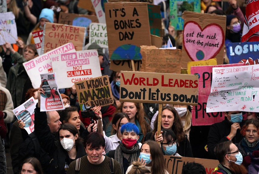 November 5, 2021, Glasgow, UK: Demonstrators during the Fridays for Future Scotland march through Glasgow during the Cop26 summit in Glasgow. Picture date: Friday November 5, 2021. Glasgow UK PUBLICAT ...