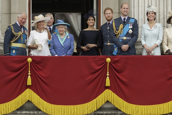 FILE - In this Tuesday, July 10, 2018 file photo, members of the royal family gather on the balcony of Buckingham Palace, with from left, Prince Charles, Camilla the Duchess of Cornwall, Prince Andrew ...