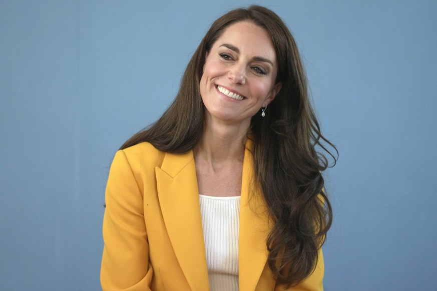 FILE - Britain&#039;s Kate, Princess of Wales, smiles as she visits the Dame Kelly Holmes Trust and meets with some of the young people that the charity supports, May 16, 2023, in Bath, England. The s ...