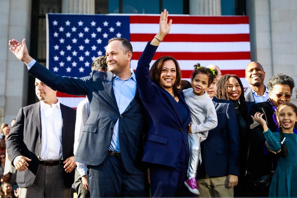 OAKLAND, CA - JANUARY 27: Senator Kamala Harris holds her niece Amara as she and her husband Douglas Emhoff wave to the crowd after holding her first presidential campaign rally in her hometown of Oak ...