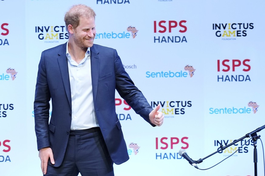 Britain&#039;s Prince Harry gestures as he leaves an event organized by the International Sports Promotion Society (ISPS) Wednesday, Aug. 9, 2023, in Tokyo. The program included topics such as the pow ...