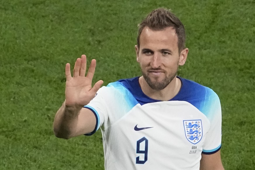 England&#039;s Harry Kane celebrates after the World Cup group B soccer match between England and Iran at the Khalifa International Stadium in Doha, Qatar, Monday, Nov. 21, 2022. (AP Photo/Pavel Golov ...