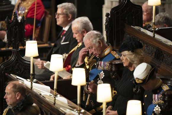 King Charles III, center, attend the committal service for Britain's Queen Elizabeth II at St George's Chapel, Windsor Castle, in Windsor, England, Monday, Sept. 19, 2022. (Joe Giddens/Pool Photo via  ...
