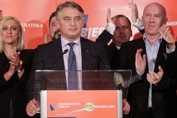 Zeljko Komsic, Democratic Front (DF) attends a news conference where he declared himself the winner of the Croat seat of the Tri-partite Bosnian Presidency in Sarajevo, Bosnia and Herzegovina October  ...
