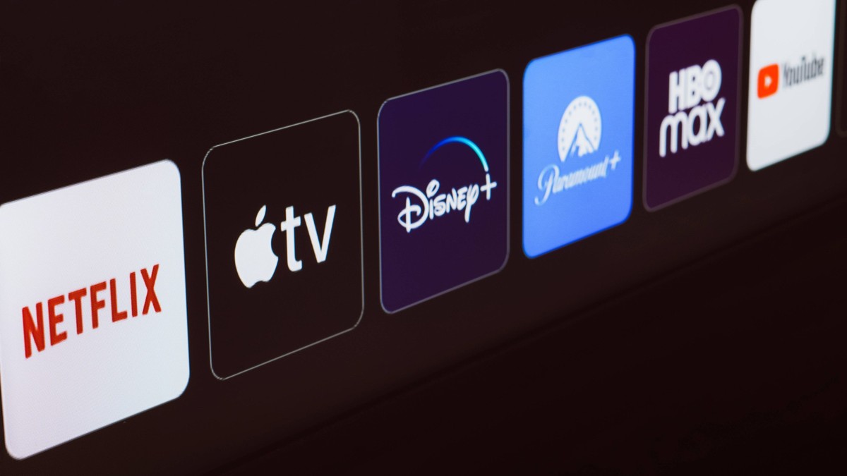 January 8, 2024, Brazil. In this photo illustration the Netflix, Apple TV, Disney Plus, Paramount Plus, HBO Max and YouTube logo is displayed on a TV screen. January 8, 2024, Brazil. In this photo ill ...