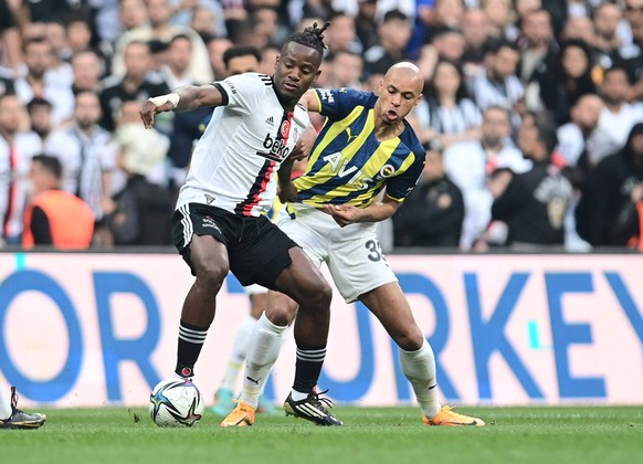 Michy Batshuayi L of Besiktas and Marcel Tisserand of Fenerbahce during the Turkish Super League football match between Besiktas and Fenerbahce at Vodafone Park Stadium in Istanbul , Turkey on May 08  ...