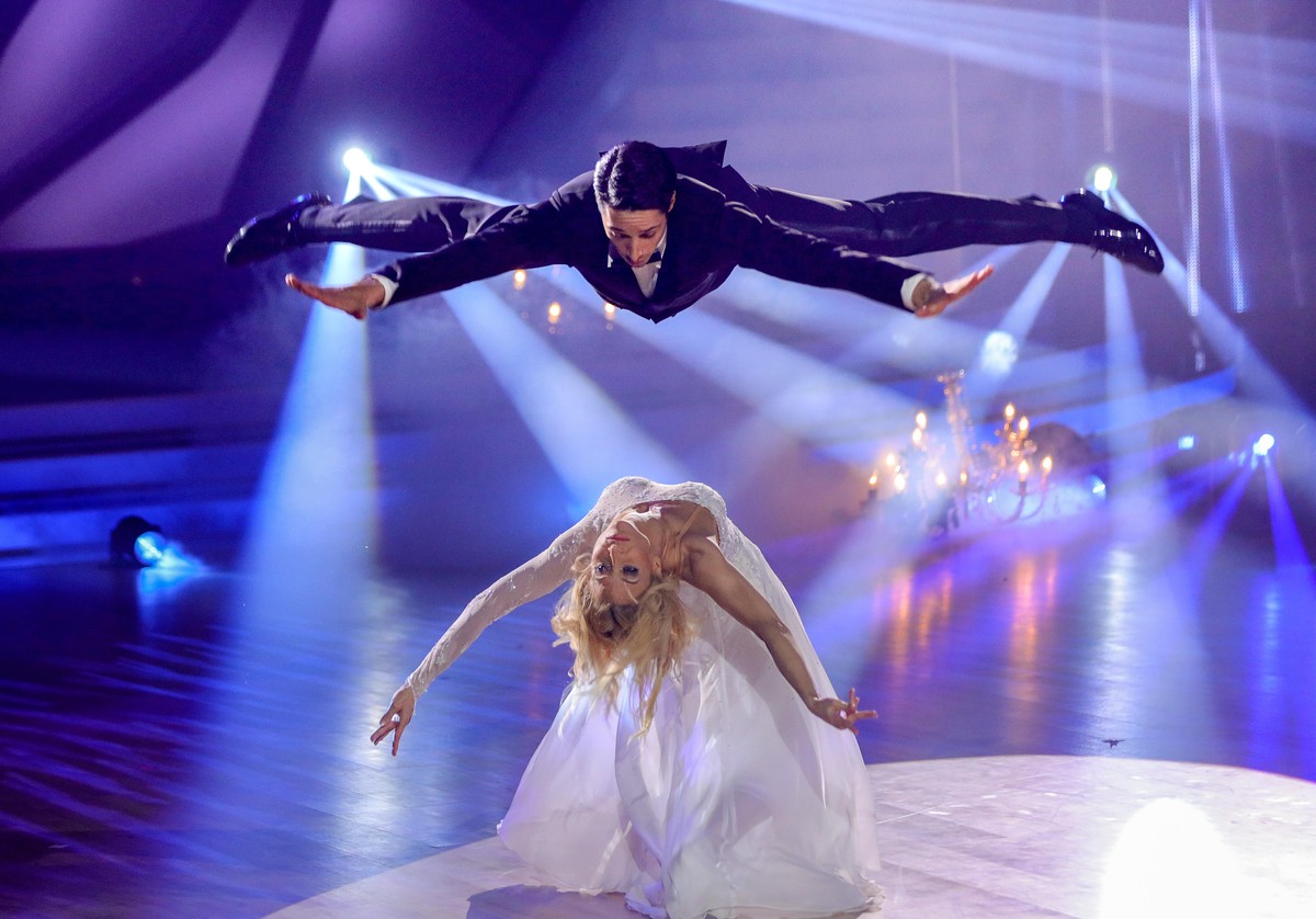 COLOGNE, GERMANY - FEBRUARY 25: René Casselly and Kathrin Menzinger perform on stage during the 1st show of the 15th season of the television competition show "Let's Dance" at MMC Studi ...