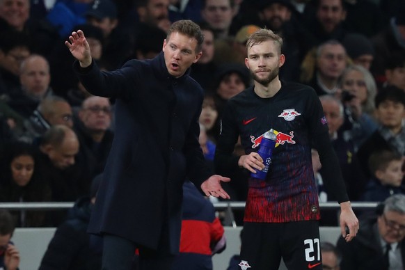 Manager Julian Nagelsmann Of Leipzig issuing instructions to Midfielder Konrad Laimer during the UEFA Champions League match between Tottenham Hotspur and RB Leipzig, at The Tottenham Hotspur Stadium, ...