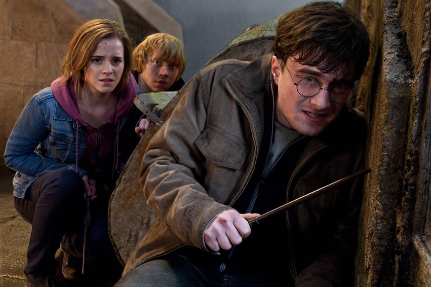 HARRY POTTER AND THE DEATHLY HALLOWS: PART 2, from left: Emma Watson, Rupert Grint, Daniel Radcliffe, 2011. ph: Jaap Buitendijk/ 2011 Warner Bros. Ent. Harry Potter publishing rights J.K.R. Harry Pott ...