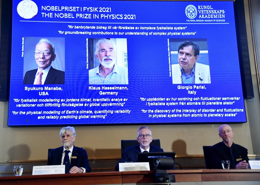 L-R Member of the Nobel Committee for Physics Thors Hans Hansson, Goran K. Hansson, Secretary General of the Royal Swedish Academy of Sciences, and Member of the Nobel Committee for Physics John Wettl ...