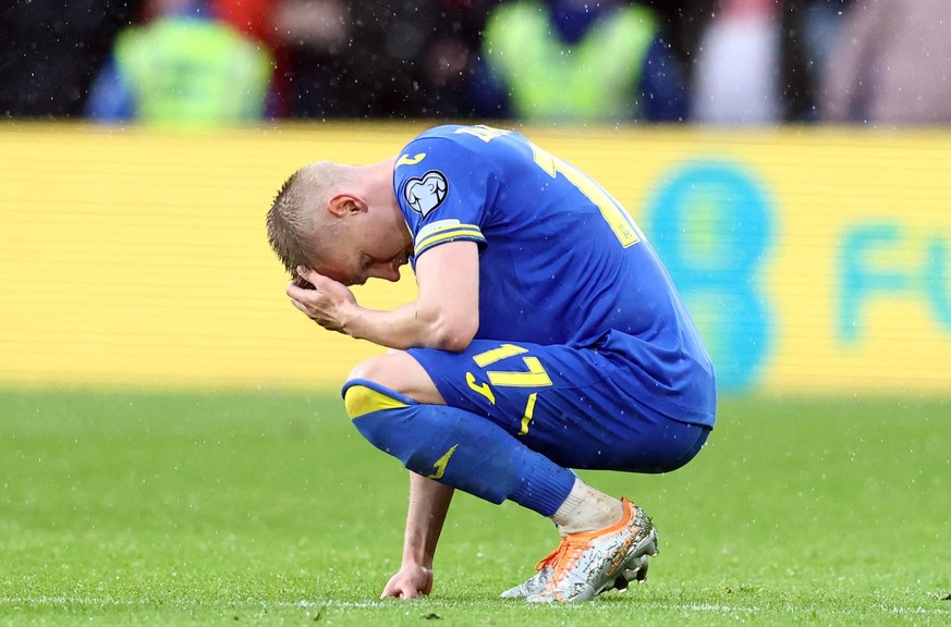 June 5, 2022, Cardiff, United Kingdom: Cardiff, Wales, 5th June 2022. Oleksandr Zinchenko of Ukraine holds his head on the final whistle during the FIFA World Cup 2022 - European Qualifying match at t ...